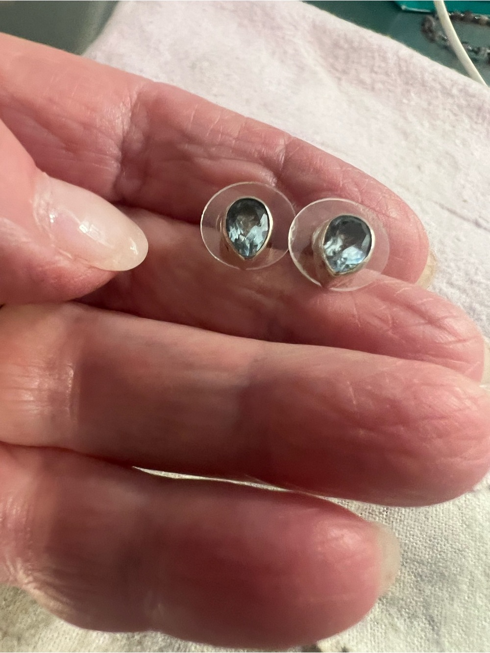 Sterling Silver Teardrop Light Blue Topaz Stud Earrings
